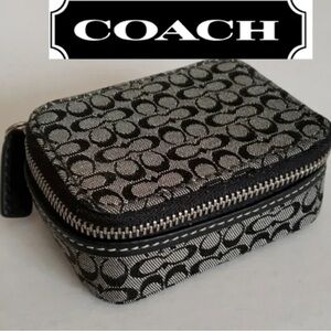 Coach Black and Gray Monogram Zip pill case it comes with two bottles
